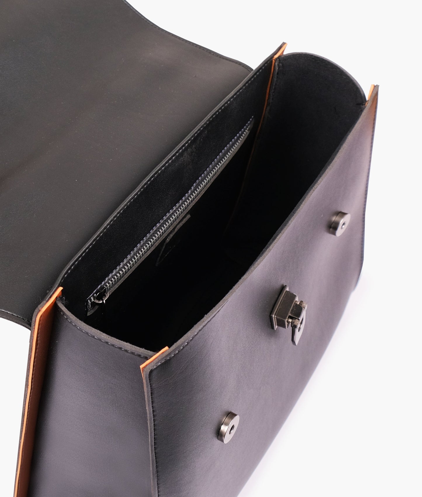 Black flap-over top-handle bag